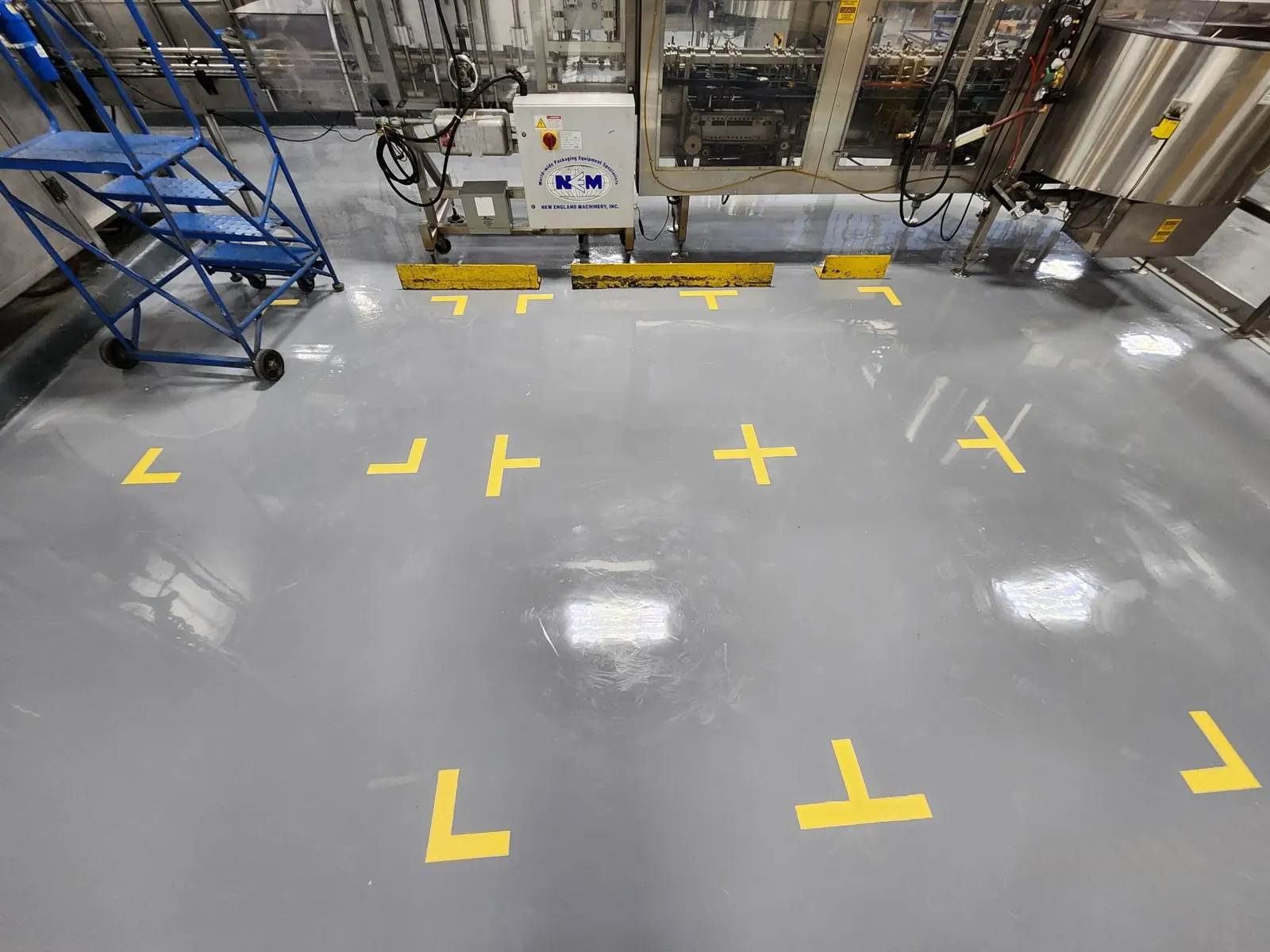 Epoxy floor coating with safety zone markings