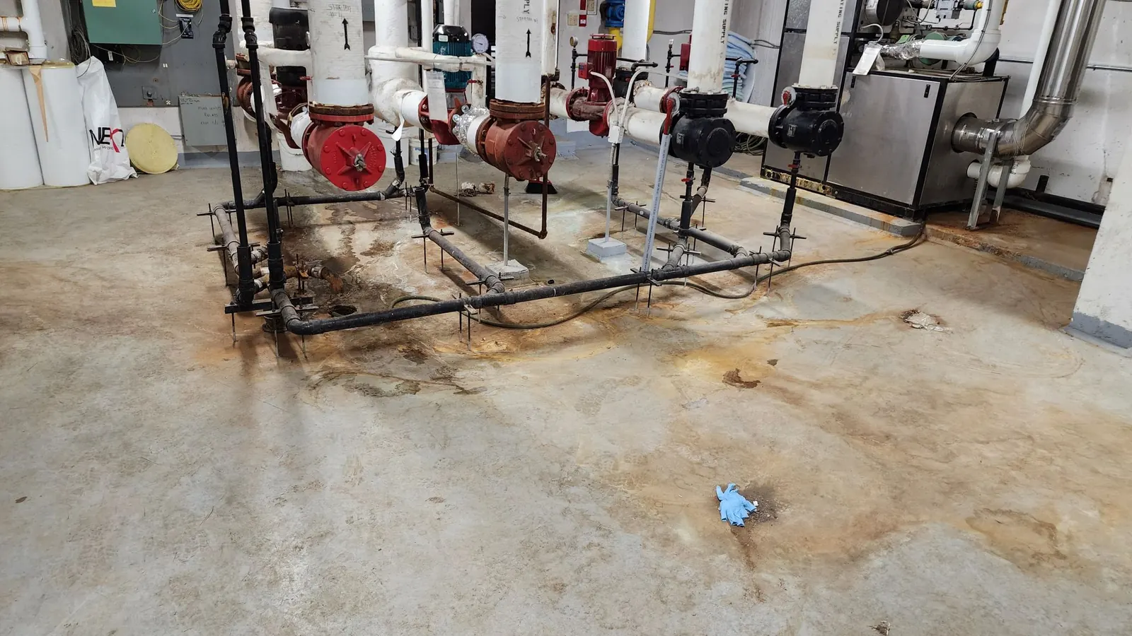 Mechanical room floor coating around piping and equipment
