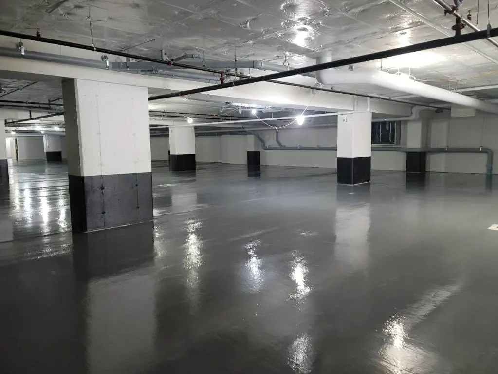 Parking structure waterproofing membrane and traffic topcoat system